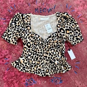 Leopard print peplum wrap top